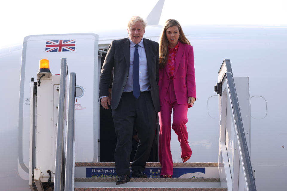 Prime Minister Boris Johnson and his wife Carrie Johnson arrive in Kigali, Rwanda ahead of the Commonwealth heads of government meeting. Picture date: Thursday June 23, 2022.