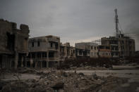 This April 14, 2019 photo shows debris from buildings destroyed during the war in Mosul, Iraq. In the summer of 2014, nearby Badoush was a launching pad for the Islamic State militants' blitz that overran Mosul and much of northern Iraq. (AP Photo/Felipe Dana)