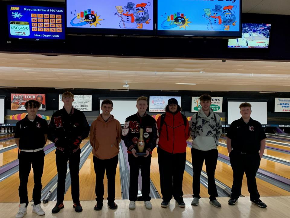 Marion Harding's boys bowling team poses with the Route 4 trophy earned earlier this season at Sandusky's Cedar Lanes after beating the Blue Streaks.