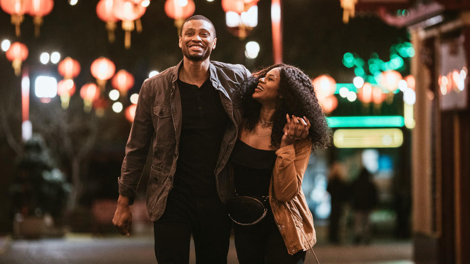 boyfriend and girlfriend walking in Chinatown in Los Angeles California