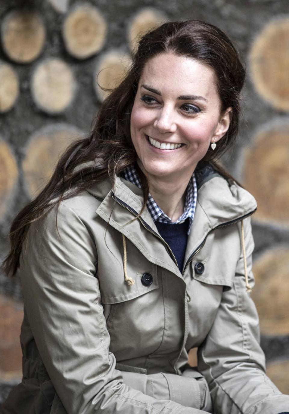 britains catherine, duchess of cambridge listens to childrens author michael morpurgo read one of his stories to children from londons vauxhall primary school during a visit to a farms for children farm in gloucestershire on may 3, 2017 photo by richard pohle pool afp photo by richard pohlepoolafp via getty images