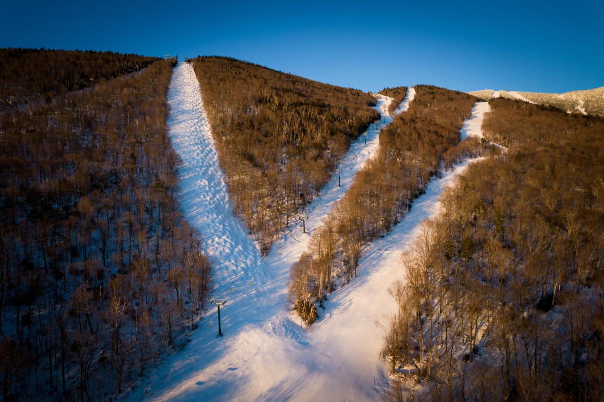 Drone's-eye view of Sugarbush's Lincoln Peak at sunrise.