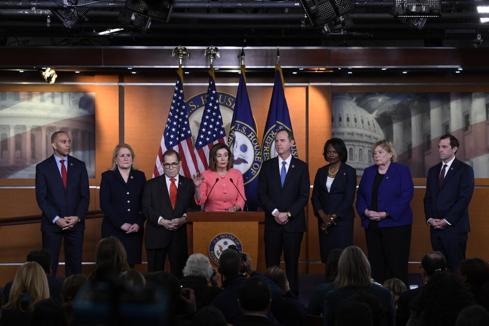 House Speaker Nancy Pelosi of Calif., speaks during a news conference to announce impeachment managers on Capitol Hill in Washington, Wednesday, Jan. 15, 2020. The U.S. House is set to vote Wednesday to send the articles of impeachment against President Donald Trump to the Senate for a landmark trial on whether the charges of abuse of power and obstruction of Congress are grounds for removal. With Pelosi from left are Rep. Hakeem Jeffries, D-N.Y., Rep. Sylvia Garcia, D-Texas, House Judiciary Committee Chairman, Rep. Jerrold Nadler, D-N.Y., Pelosi, House Intelligence Committee Chairman Adam Schiff, D-Calif., Rep. Val Demings, D-Fla., Rep. Zoe Lofgren, D-Calif. and Rep. Jason Crow, D-Colo. (AP Photo/Susan Walsh)