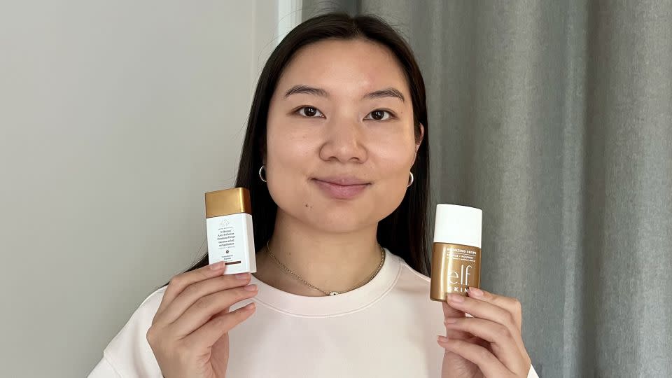 Drunk Elephant D-Bronzi Drops applied to the left side of my face. E.l.f. Cosmetics' Bronzing Drops in Pure Gold applied to the right side of my face. - Sophie Shaw/CNN Underscored