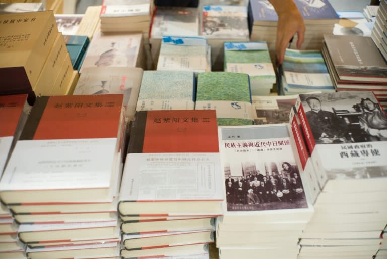 Books (bottom C-L, red cover) containing a collection of documents by late Chinese Party chief Zhao Ziyang, newly published by the Chinese University of Hong Kong Press, displayed at the Hong Kong Book Fair on July 20, 2016