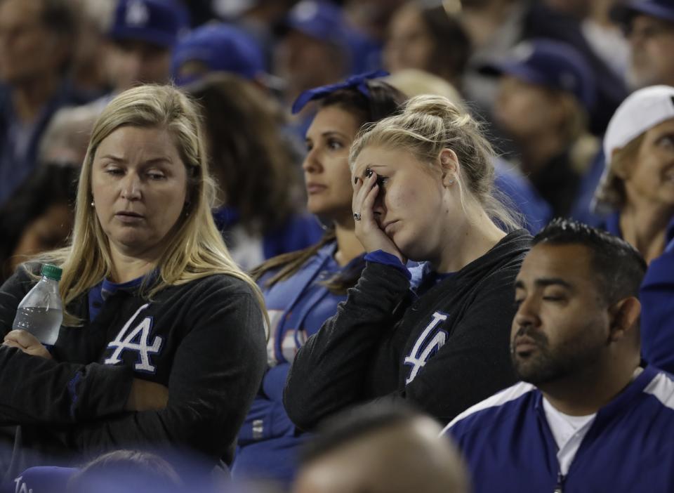 Dodgers fans watch during the eighth inning of Game 7 of the World Series. (AP)