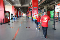 Fans walk through the concourse before Super Bowl LV between the Tampa Bay Buccaneers and the Kansas City Chiefs at Raymond James Stadium on February 07, 2021 in Tampa, Florida. (Photo by Patrick Smith/Getty Images)