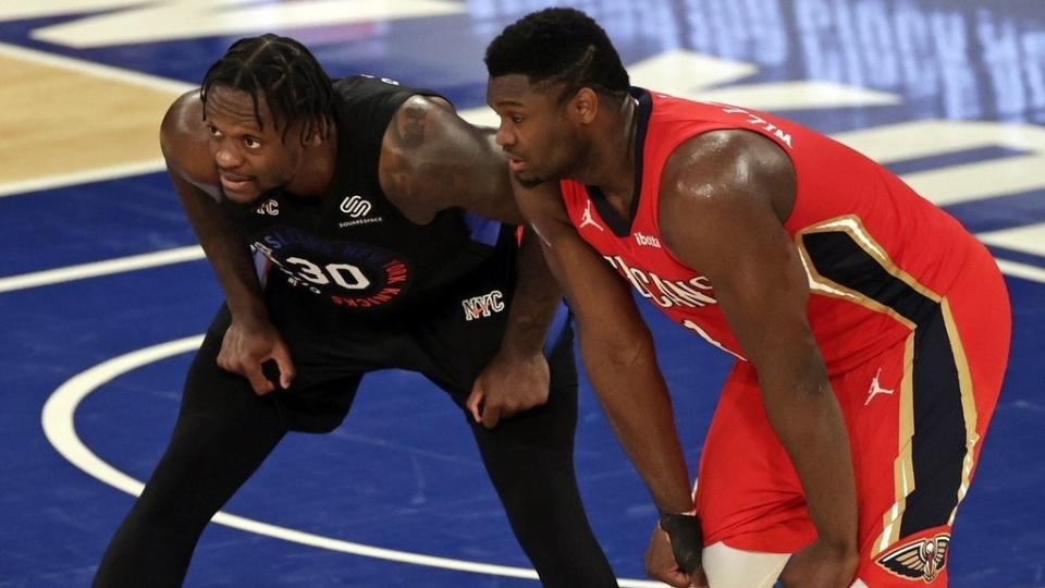 Apr 18, 2021; New York, New York, USA; New York Knicks forward Julius Randle (30) and New Orleans Pelicans forward Zion Williamson (1) react during a break in game action during the second half against the New Orleans Pelicans at Madison Square Garden. The Knicks won in overtime 122-112.