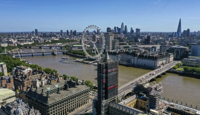 An aerial view of London showing the London Eye (centre) County Hall, Westminster Bridge leading to the Park Plaza Westminster Bridge hotel, Hungerford Bridge and the Royal Festival Hall, Waterloo Bridge, and the Queen Elizabeth Tower, which is covered in scaffolding during refurbishment, and part of the Palace of Westminster