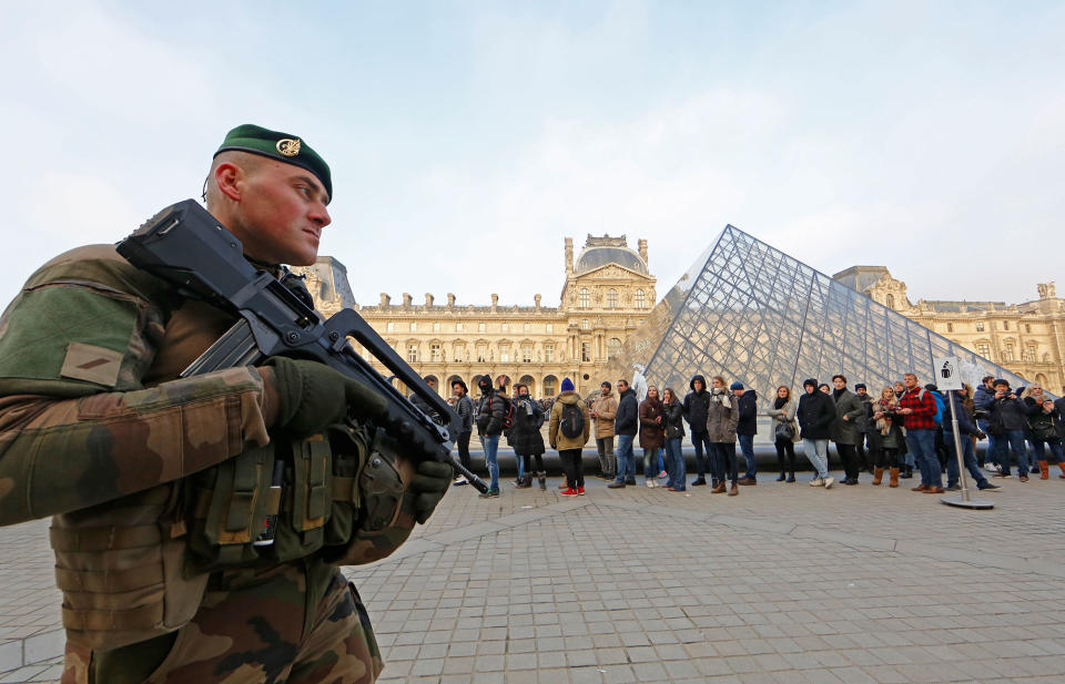 A French soldier patrols at the Louvre Museum in Paris