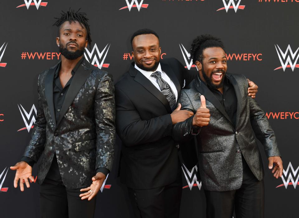 Wrestlers Kofi Kingston (L), Big E (C) and Xavier Woods (R) of "The New Day" arrive at the first-ever WWE Emmy For Your Consideration event in North Hollywood (near Los Angeles), on June 6, 2018.