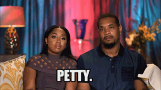 A reality show couple sitting in a confessional saying "Petty. Just so petty."
