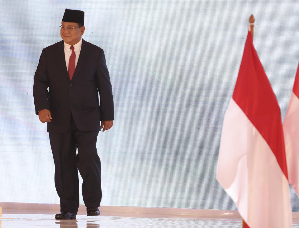 Indonesian presidential candidate Prabowo Subianto walks during a televised debate in Jakarta, Indonesia, Sunday, Feb. 17, 2019. Indonesia is gearing up to hold its presidential election on April 17 that will pit in the incumbent against the former general. (AP Photo / Achmad Ibrahim)