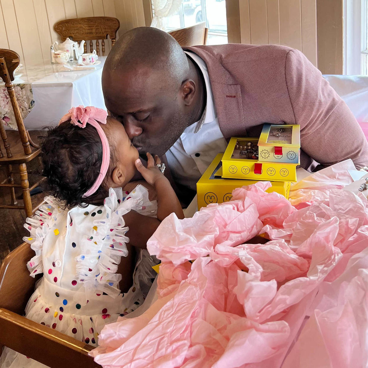 Toddler gives dad manicure (Courtesy Nika Diwa)