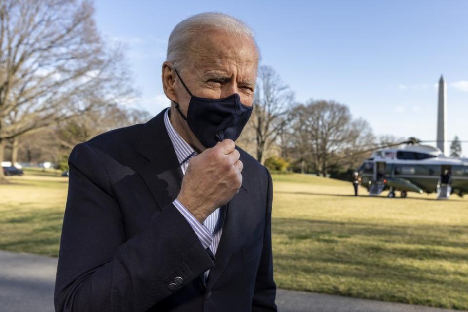 U.S. President Joe Biden stops to talk to reporters on the South Lawn of the White House on March 21, 2021 in Washington, DC. (Photo by Tasos Katopodis/Getty Images)