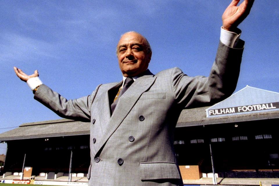 Mohammed Al-Fayed stands in front of the east stand of Craven Cottage, home of Fulham FC, in 1997 (REUTERS)