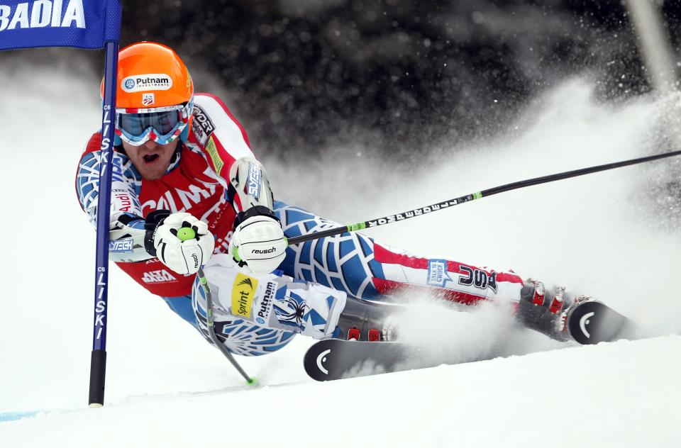 Ted Ligety of Park City, Utah, passes a gate during the first run of an alpine ski men’s World Cup giant slalom race, in Alta Badia, Italy, in this Dec. 19, 2010, file photo. | Marco Trovati, Associated Press