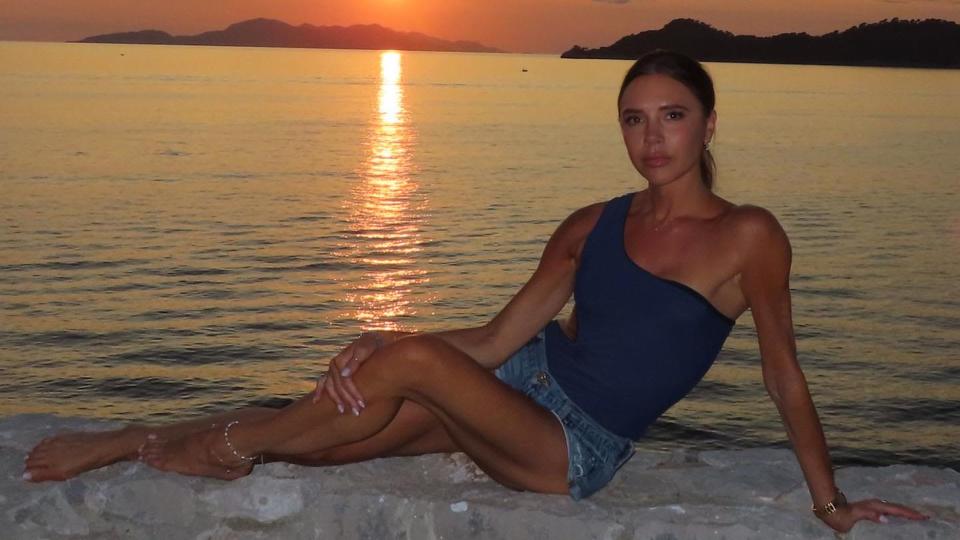 victoria beckham wearing denim shorts in croatia