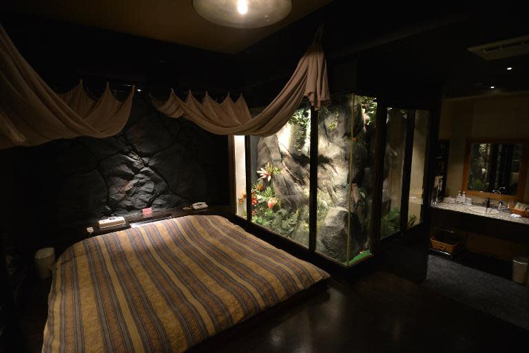 This picture taken on February 5, 2014 shows a jungle style room of a love hotel called "The Rock Kowloon Walled City" in Iruma, suburban Tokyo