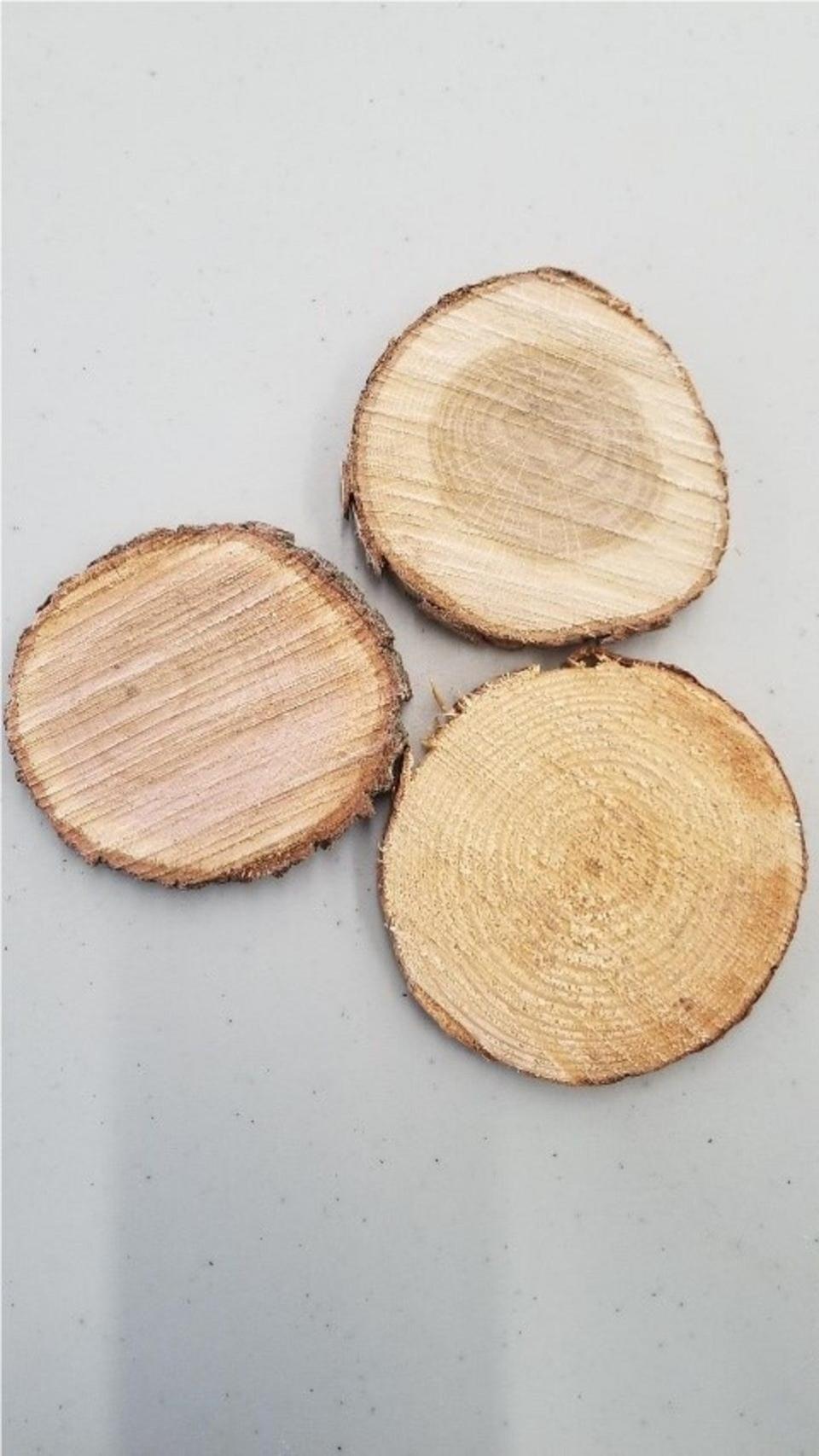 The trunks of used Christmas trees can be cut to make drink coasters.