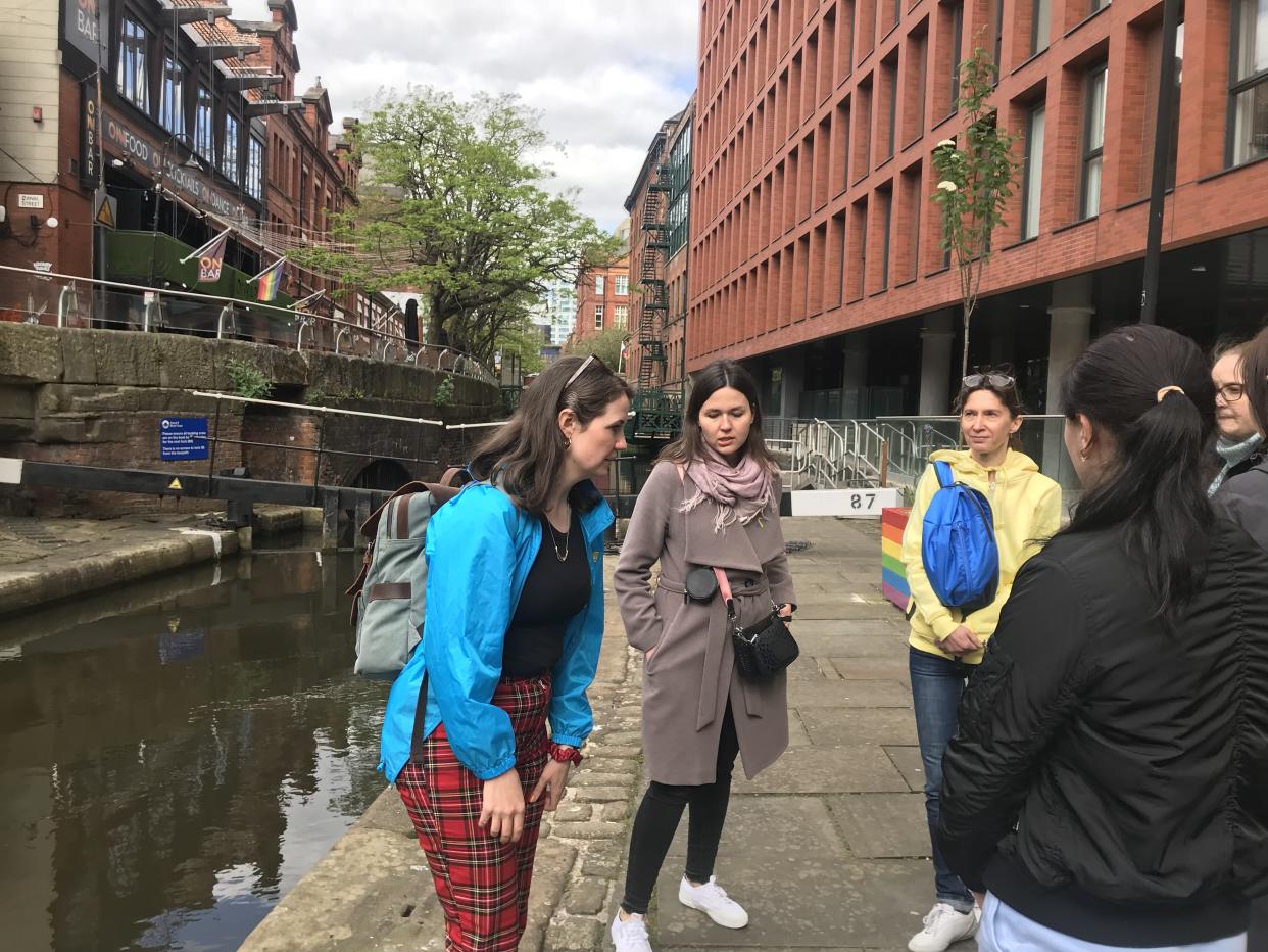 Megan Marie Griffith and Maria Romanenko leading a tour of Manchester