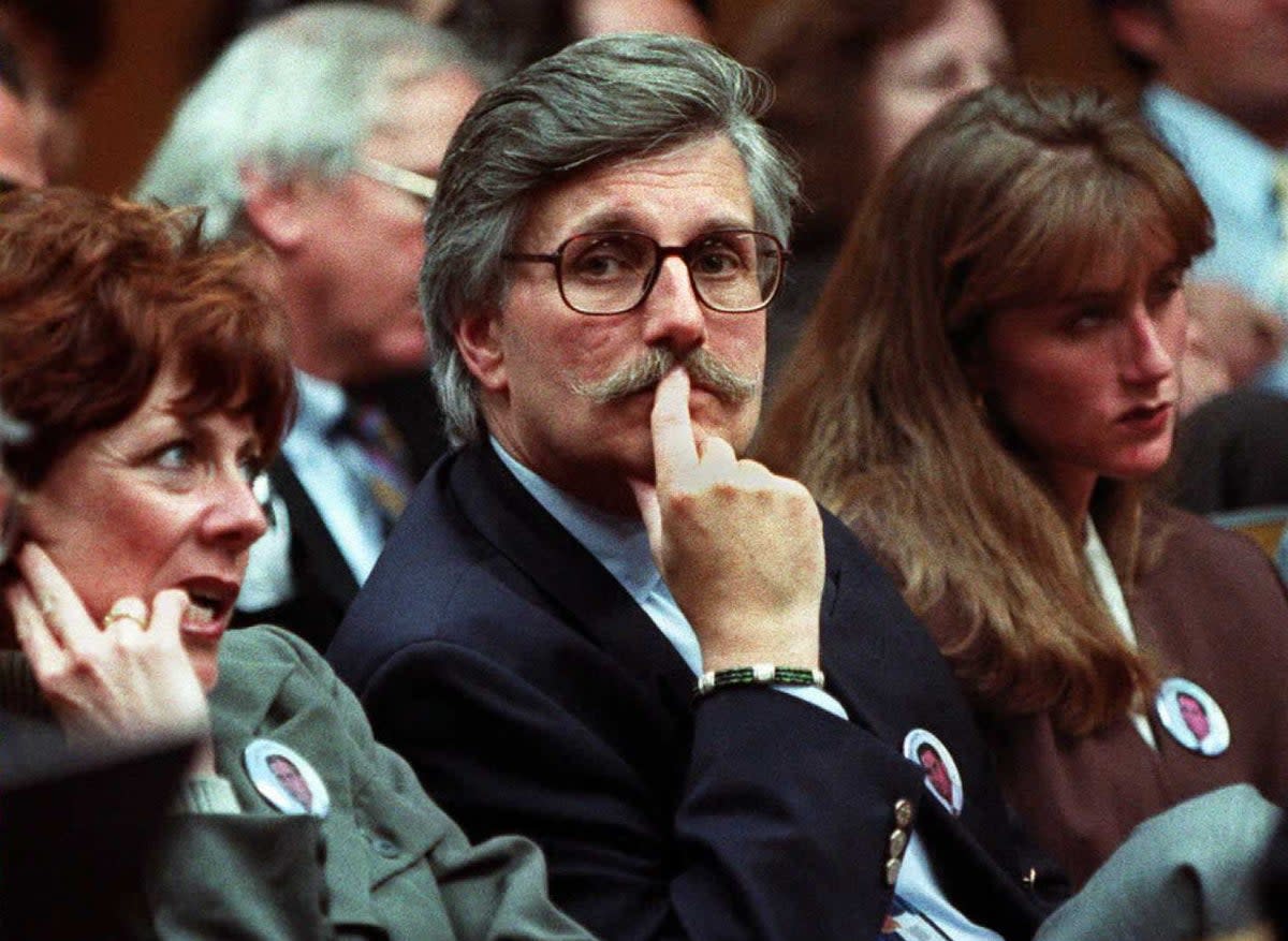 Fred Goldman (centre), wife Pattie (left) and daughter Kim (right) in court during the 1994 murder trial of OJ Simpson, who was later aquitted of the murder of Ron Goldman and Nicole Brown (AFP via Getty Images)