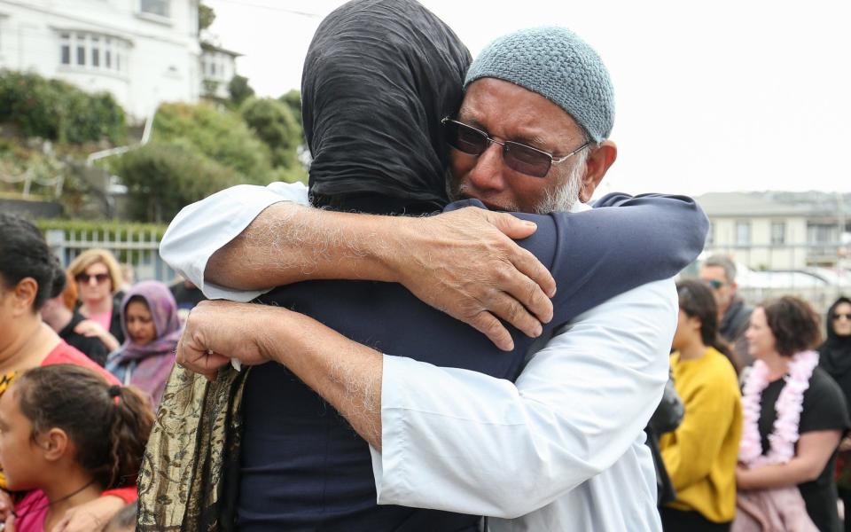Prime Minister Jacinda Ardern hugs a mosque-goer at the Kilbirnie Mosque - Getty Images AsiaPac