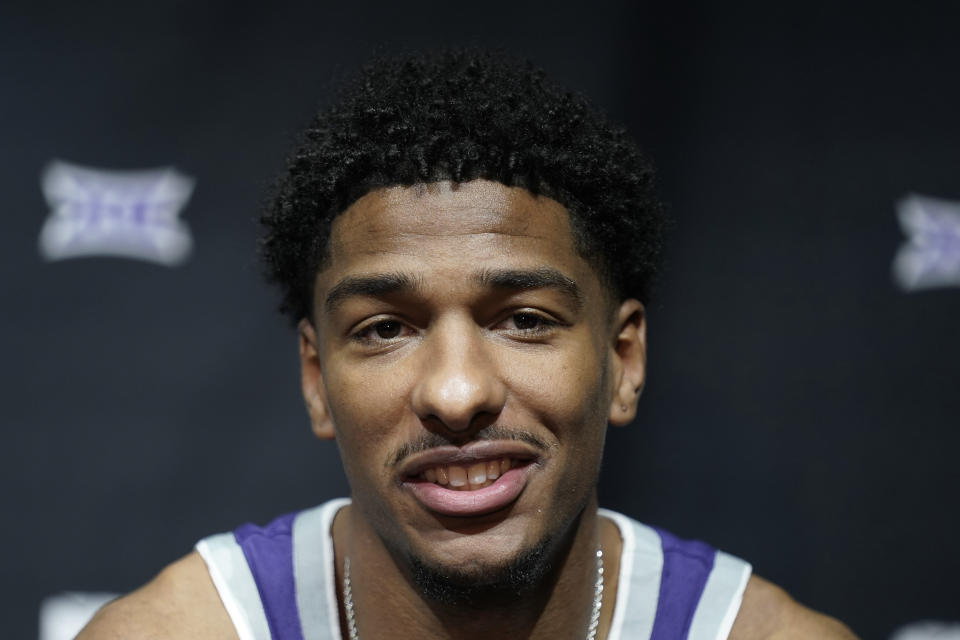Kansas State's David N'guessan speaks to the media during the NCAA college Big 12 men's basketball media day Wednesday, Oct. 18, 2023, in Kansas City, Mo. (AP Photo/Charlie Riedel)