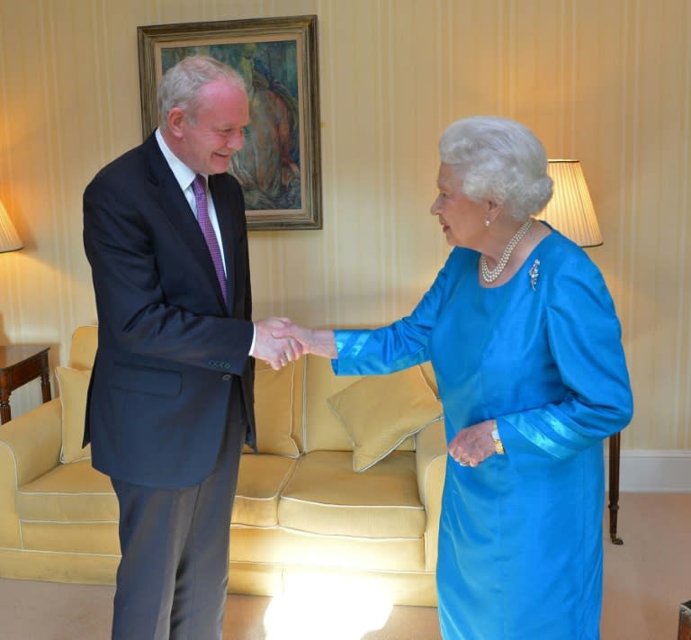 Britain's Queen Elizabeth II shakes hands with the late Martin McGuinness at Hillsborough Castle, in Northern Ireland, in June 2014