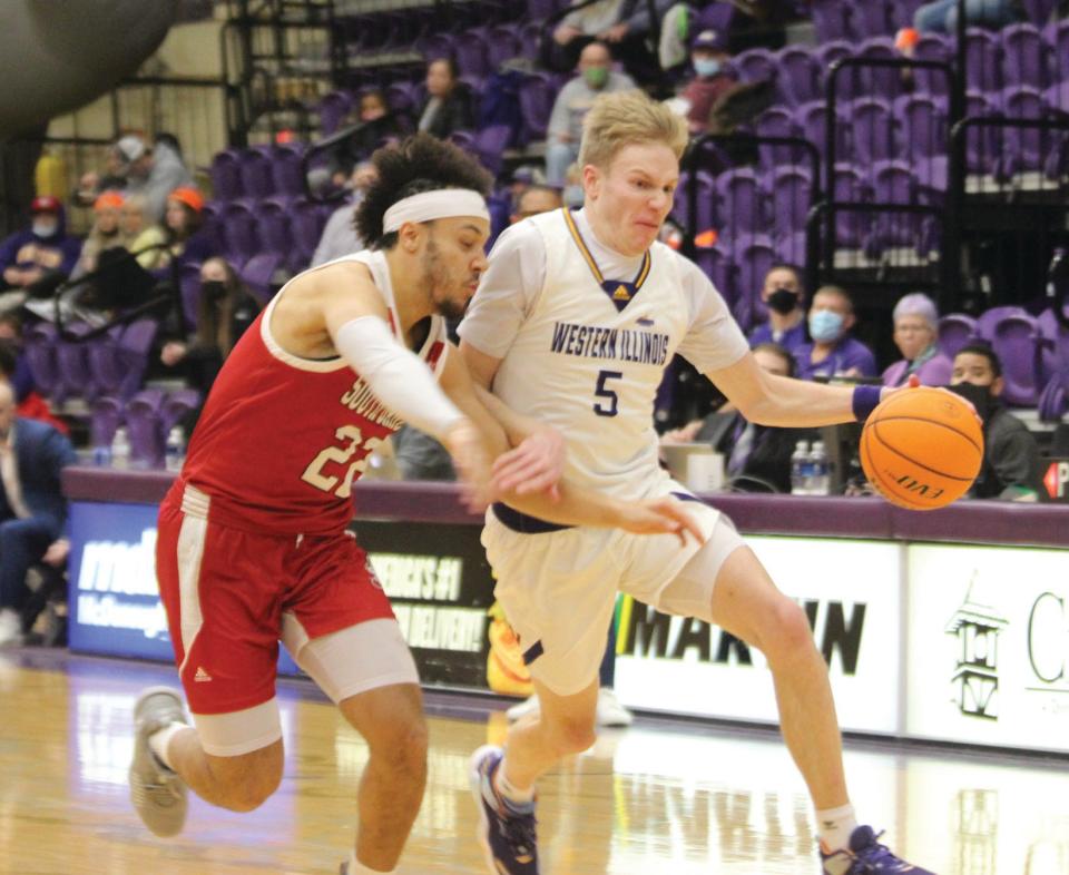 Western Illinois' Trenton Massner goes to the basket.