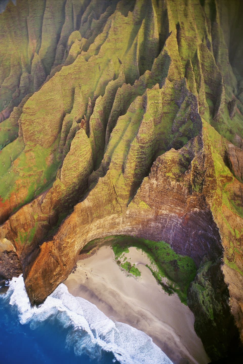 <p><strong>Where: </strong><a href="https://go.redirectingat.com?id=74968X1596630&url=https%3A%2F%2Fwww.tripadvisor.com%2FTourism-g29218-Kauai_Hawaii-Vacations.html&sref=https%3A%2F%2Fwww.prevention.com%2Flife%2Fg26815809%2Fmost-beautiful-places-in-america%2F" rel="nofollow noopener" target="_blank" data-ylk="slk:Honopu Beach, Hawaii;elm:context_link;itc:0;sec:content-canvas" class="link ">Honopu Beach, Hawaii</a></p><p><strong>Why We Love It: </strong>While there are too many <a href="https://www.countryliving.com/life/travel/g4033/best-beaches-in-usa/" rel="nofollow noopener" target="_blank" data-ylk="slk:beautiful beaches;elm:context_link;itc:0;sec:content-canvas" class="link ">beautiful beaches</a> in Hawaii to pick just one, the remoteness of this stretch of sand on Kauai's Na Pali Coast make it one of our favorites.</p>