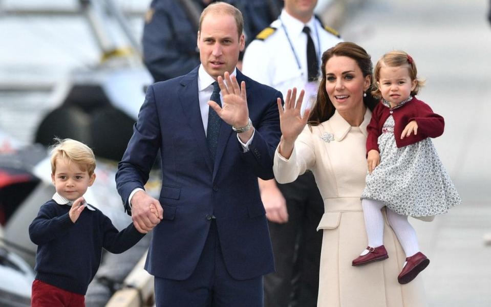 The Duke and Duchess of Cambridge with their children on their tour of Canada last year - Credit: Dominic Lipinski/PA