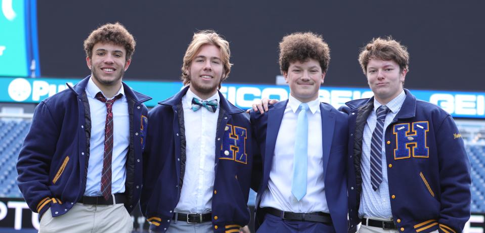 Hull High football captains Jordan Stilphen, from left, Aidan Robey, Ryan Dunn and Aidan Murphy at the MIAA state championship breakfast at Gillette Stadium on Tuesday, Nov. 23, 2021.