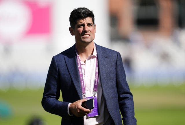 Sir Alastair Cook with microphone in hand