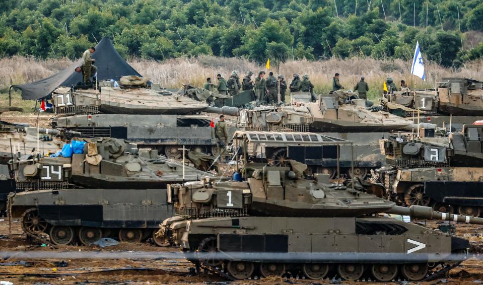 Israeli soldiers prepare for the scenario of ground maneuvers at an undisclosed location near the border with Gaza (EPA)