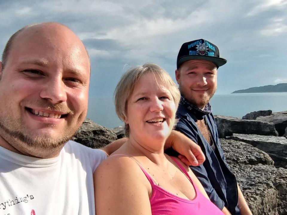 Gabriele Schart, centre, was killed in Mexico on Saturday, say her sons, Corin, right, and Michael, left. They're working to get answers from authorities in Mexico and prepare a funeral in Zipolite, where their mother lived for the last decade. (Supplied by Raquel Shulman - image credit)