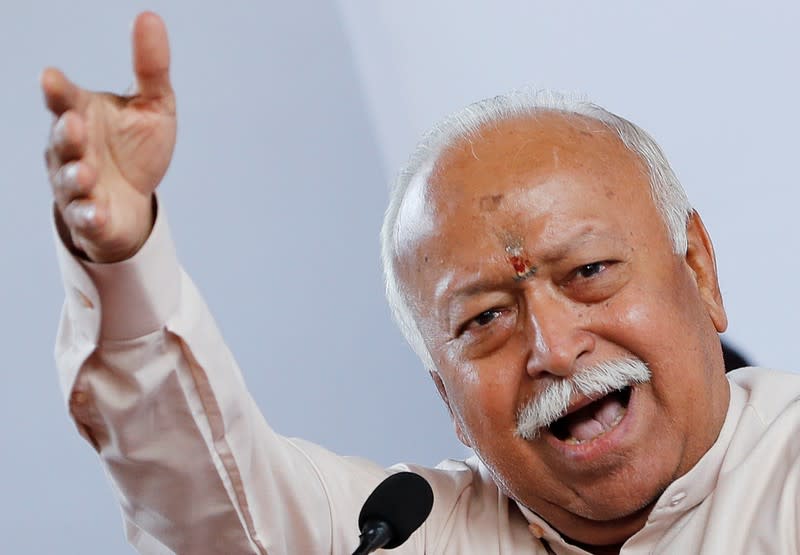 Mohan Bhagwat, chief of the Hindu nationalist organisation Rashtriya Swayamsevak Sangh (RSS), gestures as he addresses a news conference in New Delhi