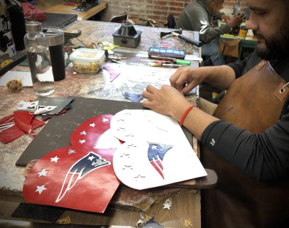 A Rocketbuster Handmade Custom Boots employee works on a pair of boots for Jane Fonda for her new movie, "80 for Brady."