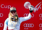 Alpine Skiing - Alpine Skiing World Cup - Women's Super-G World Cup victory ceremony - St. Moritz, Switzerland - 17/3/16 - Lara Gut of Switzerland reacts REUTERS/Arnd Wiegmann