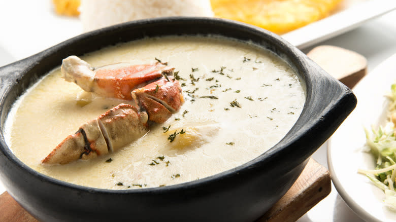 Crab chowder with crab leg