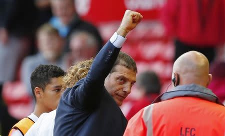 Football - Liverpool v West Ham United - Barclays Premier League - Anfield - 29/8/15 West Ham manager Slaven Bilic celebrates at the end of the match Reuters / Eddie Keogh Livepic