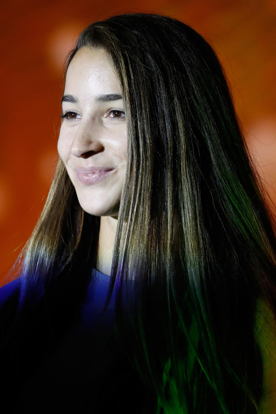 Raisman sans makeup on the runway in New York, Sept. 13. (Olay)