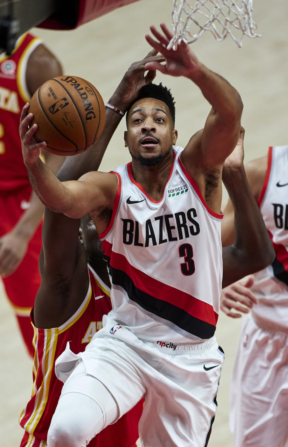 Portland Trail Blazers guard CJ McCollum shoots against the Atlanta Hawks during the first half of an NBA basketball game in Portland, Ore., Saturday, Jan. 16, 2021. (AP Photo/Craig Mitchelldyer)