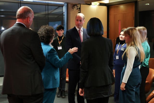 The Prince of Wales listens to Senedd Llywydd Elin Jones (second left) as he meets members of the Welsh Youth Parliament 