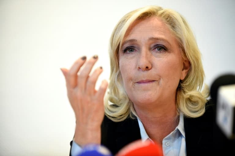 Marine Le Pen, présidente du Rassemblement National (RN) et candidate à la présidentielle, lors d'une conférence de presse, le 23 septembre 2021 à Metz. - JEAN-CHRISTOPHE VERHAEGEN © 2019 AFP