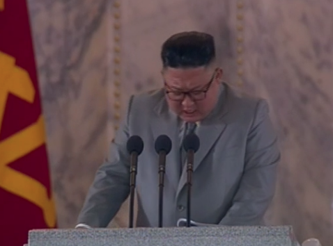 Kim Jong-un delivers speech during North Korea military parade (KCNA TV)