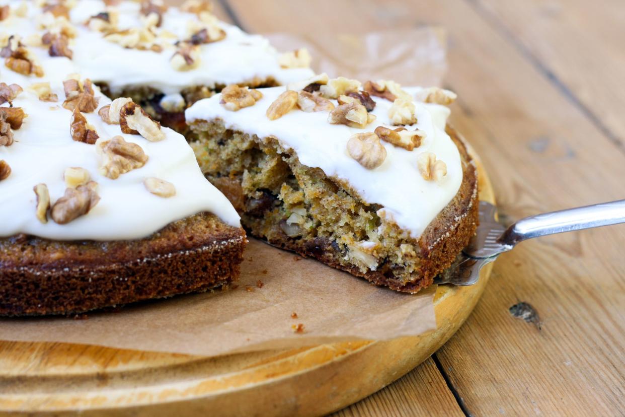 Carrot and courgette cake with nuts and raisin, with yogurt frosting