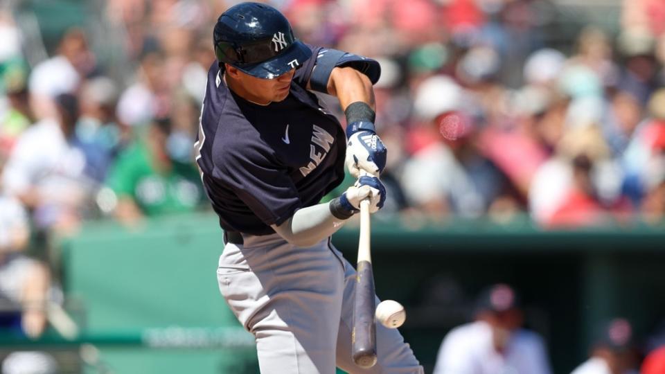 Mar 12, 2023;  Fort Myers, Florida, USA;  New York Yankees shortstop Anthony Volpe (77) doubles against the Boston Red Sox in the third inning during spring training at JetBlue Park at Fenway South.