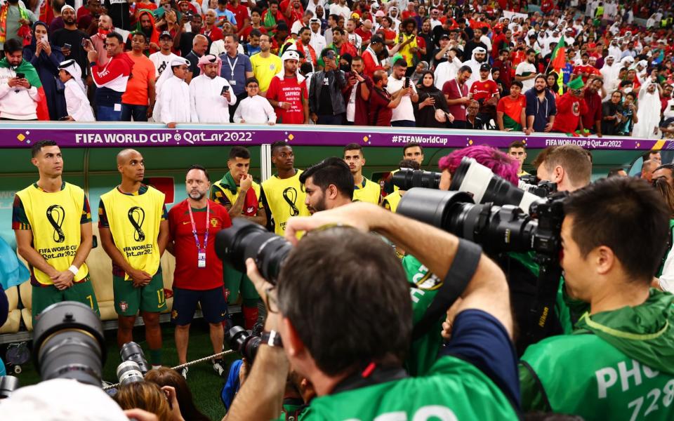 Photographers focus on Cristiano Ronaldo ahead of Portugal's 6-1 rout of Switzerland - The four stages of Cristiano Ronaldo being dropped to the bench - Chris Brunskill/Getty Images