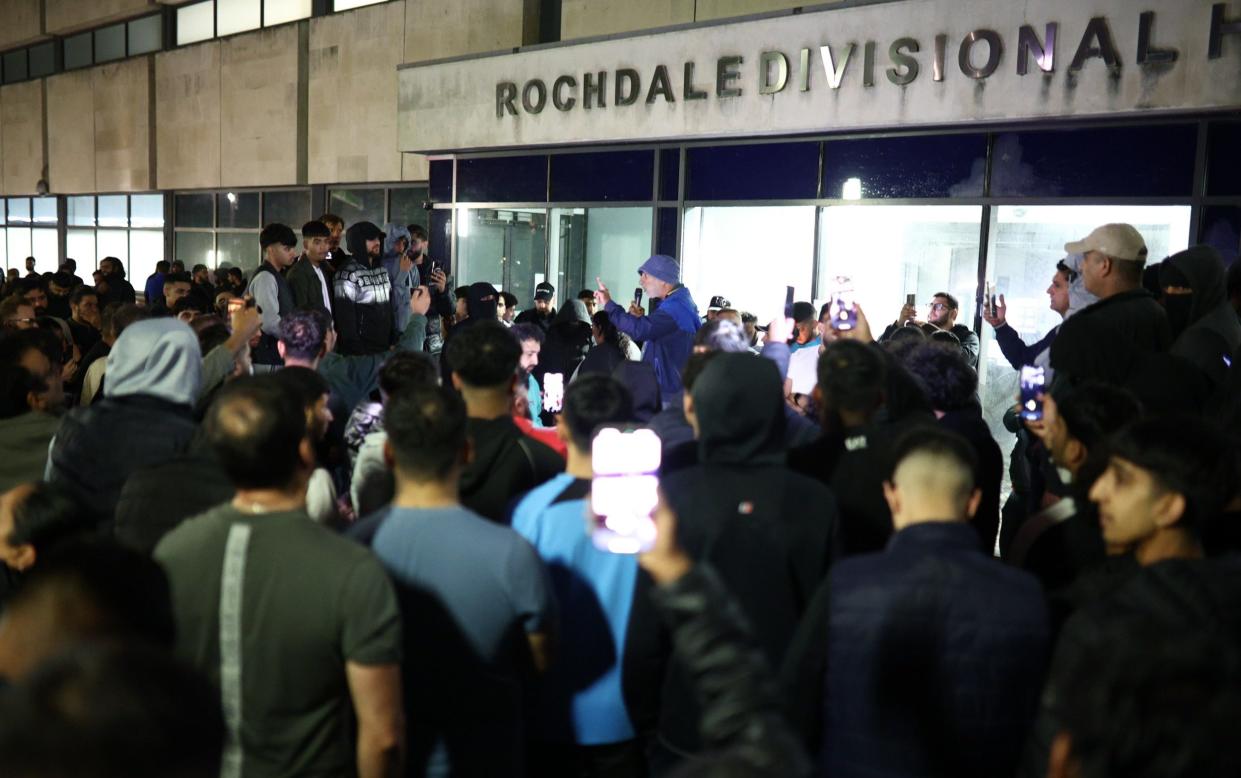 Hundreds of protesters gathered outside Rochdale Police Station